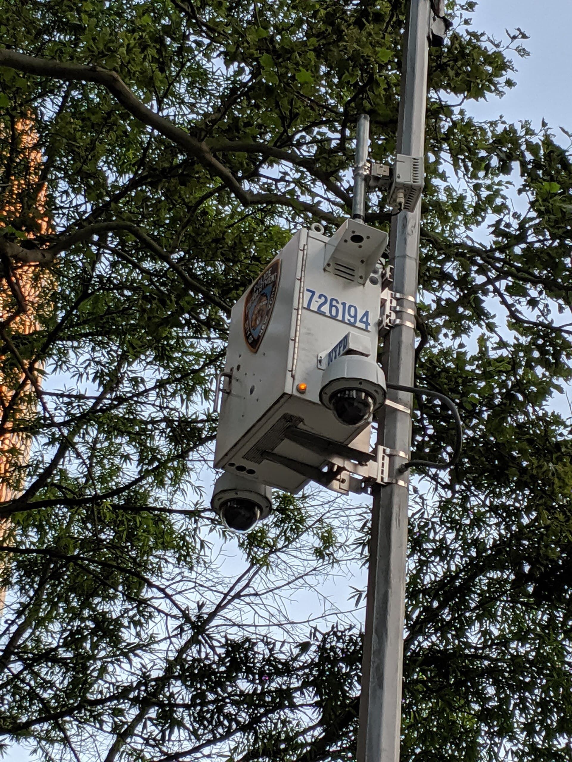 Industrial surveillance cameras monitoring a site